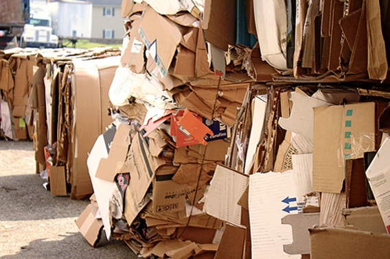 Used cardboard stored on pallets.