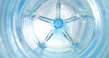 Inside a 5-gallon water container.